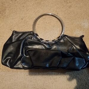 Elegant Black Leather Handbag with Silver Handles